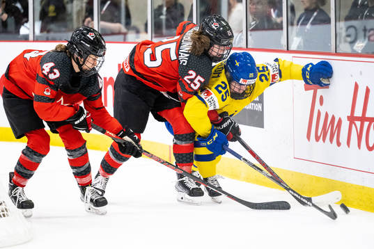 Claire Thompson and Jaime Bourbonnais of Canada and Lina