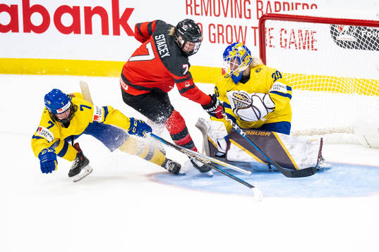 Mira Jungåker and goaltender Emma Söderberg of Sweden and