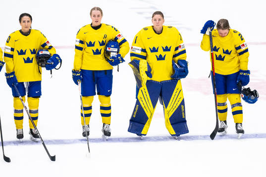 Fanny Rask, Olivia Carlsson, goaltender Sara Grahn and