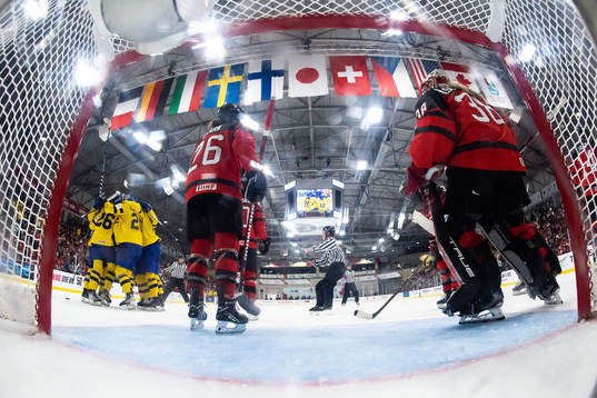 Players of Sweden celebrate Hilda Svensson scoring 2-2