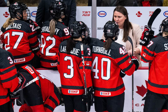 Assistant coach Kori Cheverie of Canada