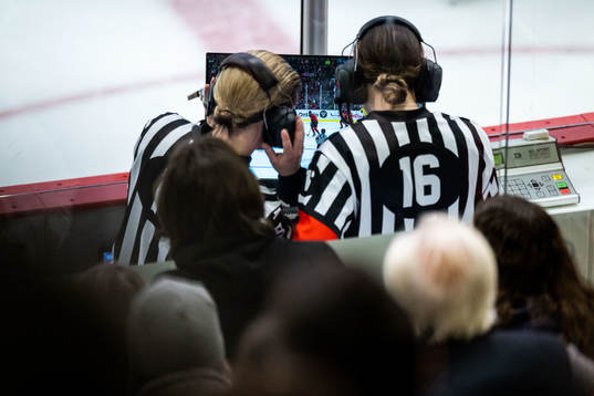 The referees are checking the 2-2 goal scored by Hilda