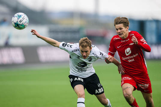 Dennis Gjengaar of Odd and David Møller Wolfe of Brann
