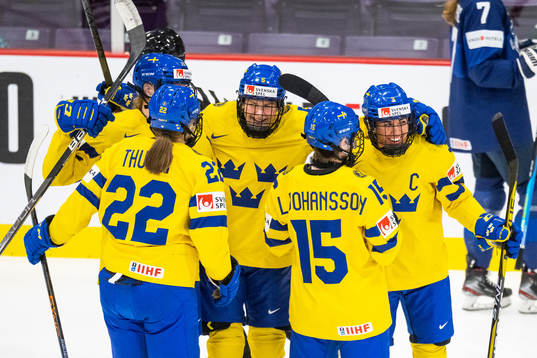 Anna Kjellbin of Sweden celebrtaes with team mates