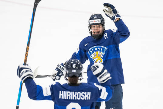 Jenni Hiirikoski and Noora Tulus of Finland celebrate
