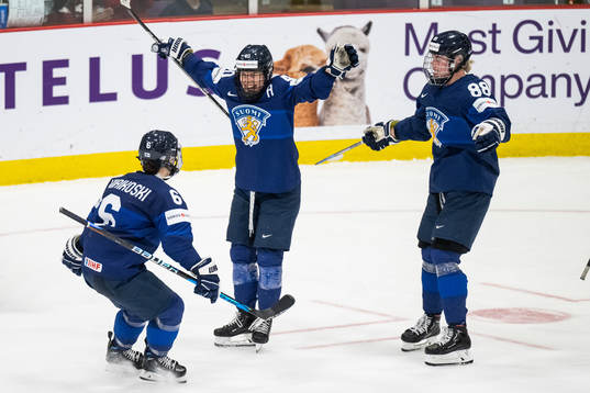 Jenni Hiirikoski and Ronja Savolainen celebrate with Noora