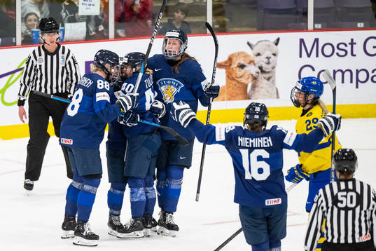 Ronja Savolainen and Noora Tulus of Finland celebrate