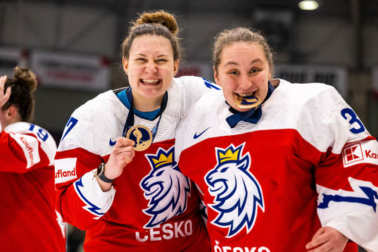 Karolina Kosinova and goaltender Katerina Zechovska of