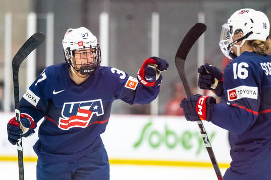 Abbey Murphy of USA celebrates scoring 1-1