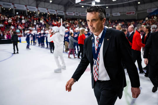 Assistant coach Doug Derraugh of Canada looks dejected