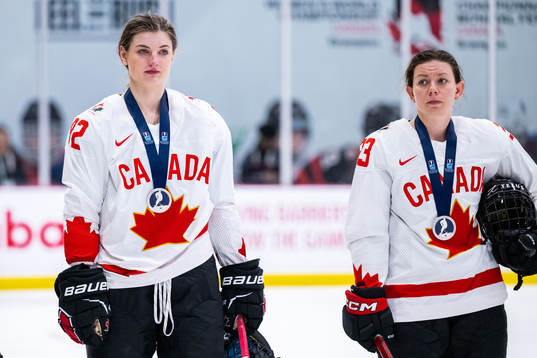 Danielle Serdachny and Erin Ambrose of Canada looks dejected