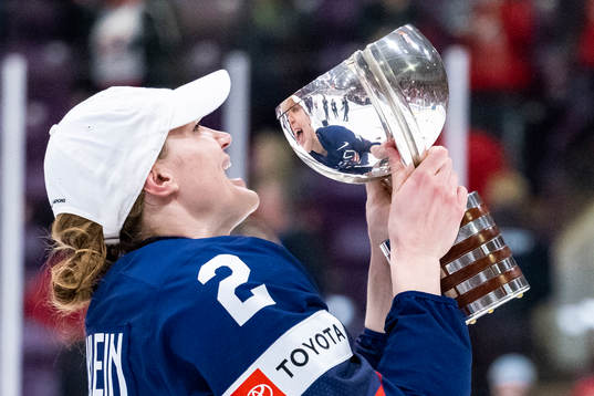 Lee Stecklein of USA celebrate winning the 2023 IIHF