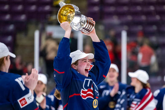 Player of USA celebrates winning the 2023 IIHF Women's