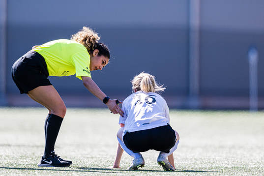 Maliha Ahmady, referee, and Lina Osland Forthun of