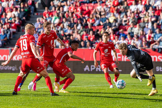 Japhet Sery Larsen and goalkeeper Mathias Dyngeland of