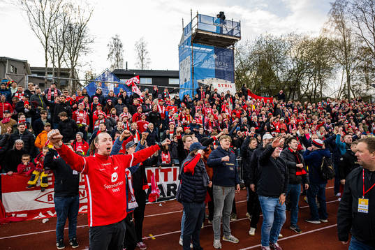 Spectators in the stands celebrates
