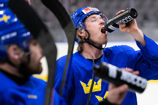 Rasmus Sandin of Sweden drinks water at a practice session