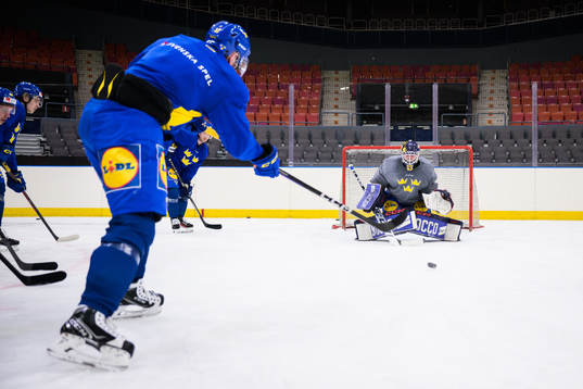 Lukas Bengtsson of Sweden shoots towards Marcus Högberg at