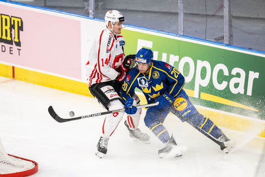 Dean Kukan of Switzerland and André Petersson of Sweden