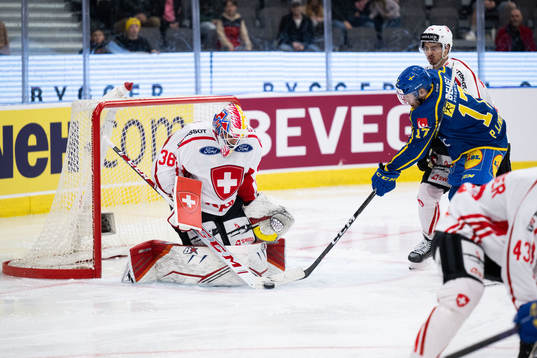 Goaltender Joren van Pottelberghe of Switzerland and Pär