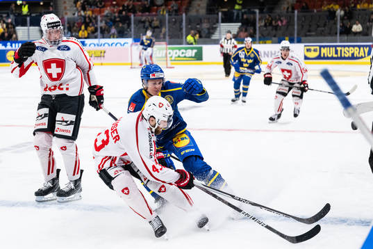 Mike Kunzle and Andrea Glauser of Switzerland against