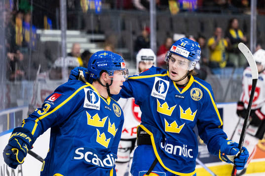 Lucas Raymond and Leo Carlsson of Sweden celebrate