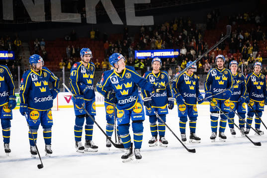 Lucas Raymond of Sweden celebrates with teammates