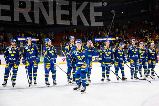 Lucas Raymond of Sweden celebrates with teammates