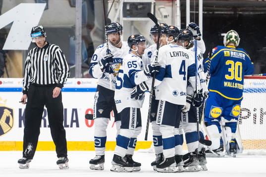 Teemu Hartikainen of Finland celebrate with teammates