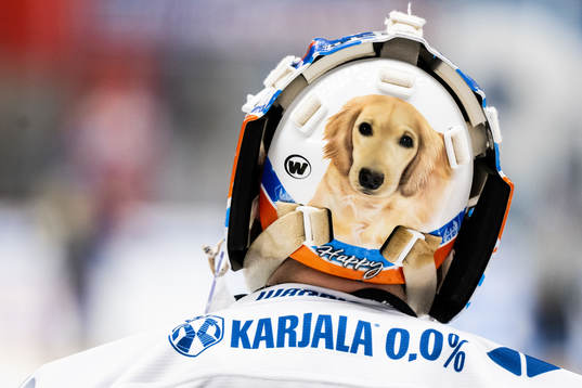 Goaltender Christian Heljanko of Finland with picture of a
