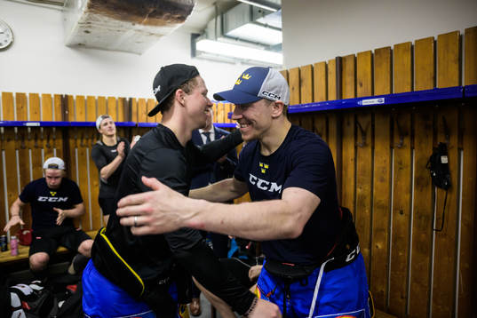 Lucas Raymond and Pär Lindholm of Sweden celebrate in the