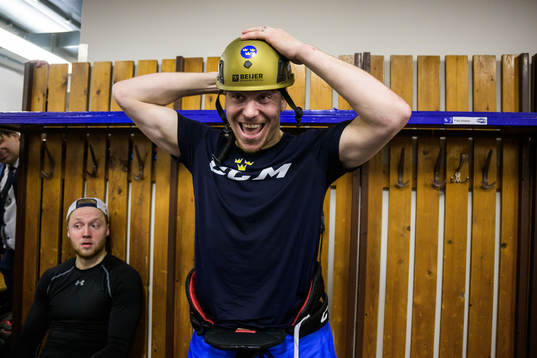 Pär Lindholm of Sweden celebrates in the dressing room
