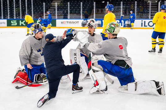 Goaltender Lars Johansson, goaltender coach Stefan Ladhe,