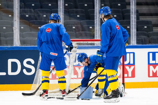 Rasmus Sandin, Lucas Raymond and Leo Carlsson of Sweden at