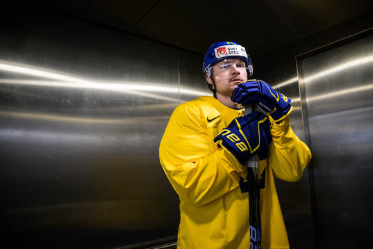Carl Grundström of Sweden in an elevator to get to a