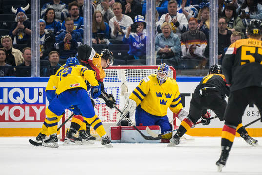 Nico Sturm and Maximimilian Kastner of Germany challenge