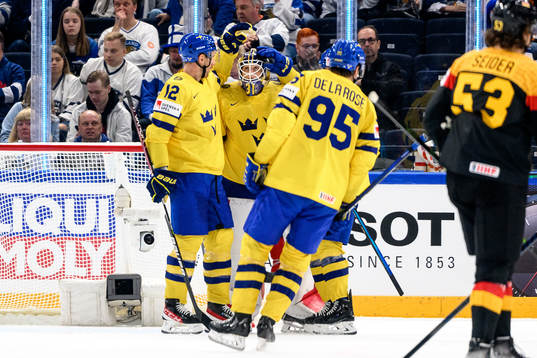Patrik Nemeth and goaltender Lars Johansson celebrate