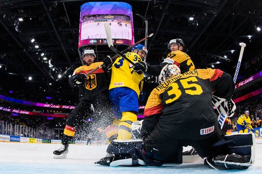 Jakob Silfverberg of Sweden challenges Maximimilian