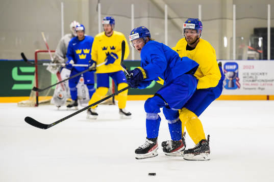 Rasmus Sandin and Oscar Lindberg of Sweden at a practice