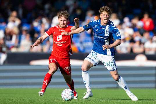 Ole Didrik Blomberg of Brann and Victor Torp of Sarpsborg 08