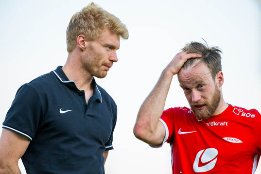 Sivert Heltne Nilsen and Bård Finne of Brann look dejected