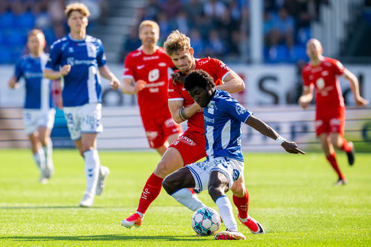 Ole Didrik Blomberg of Brann and Christopher Bonsu Baah of