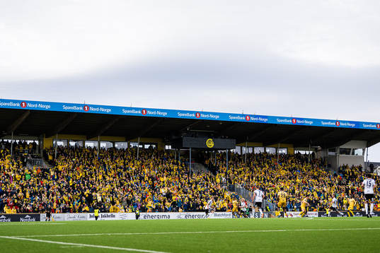 Spectators in the stands at Aspmyra Stadion