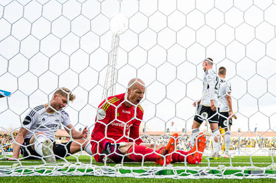 Tobias Børkeeiet and goalkeeper Andre Hansen of Rosenborg