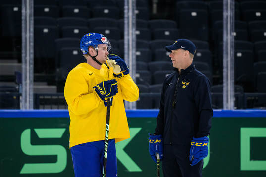 Carl Grundström and assistant coach Nicklas Rahm of Sweden