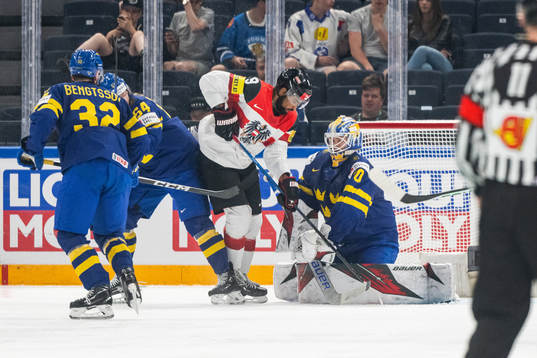 Lukas Bengtsson, Anton Lindholm and goaltender Jesper