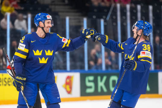 Patrik Nemeth and Rasmus Sandin of Sweden celebrate