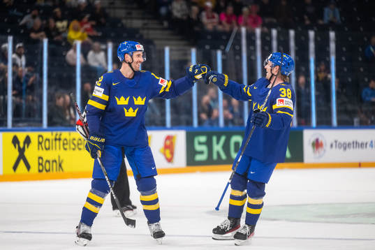 Patrik Nemeth and Rasmus Sandin of Sweden celebrate