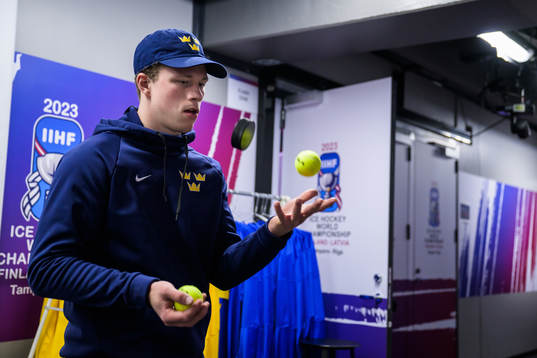 Lucas Raymond of Sweden warms up