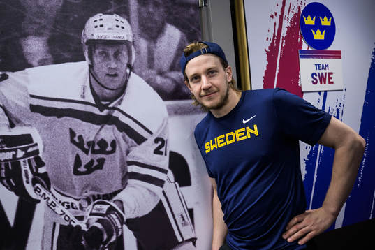 Jonathan Pudas of Sweden poses in front of a picture of
